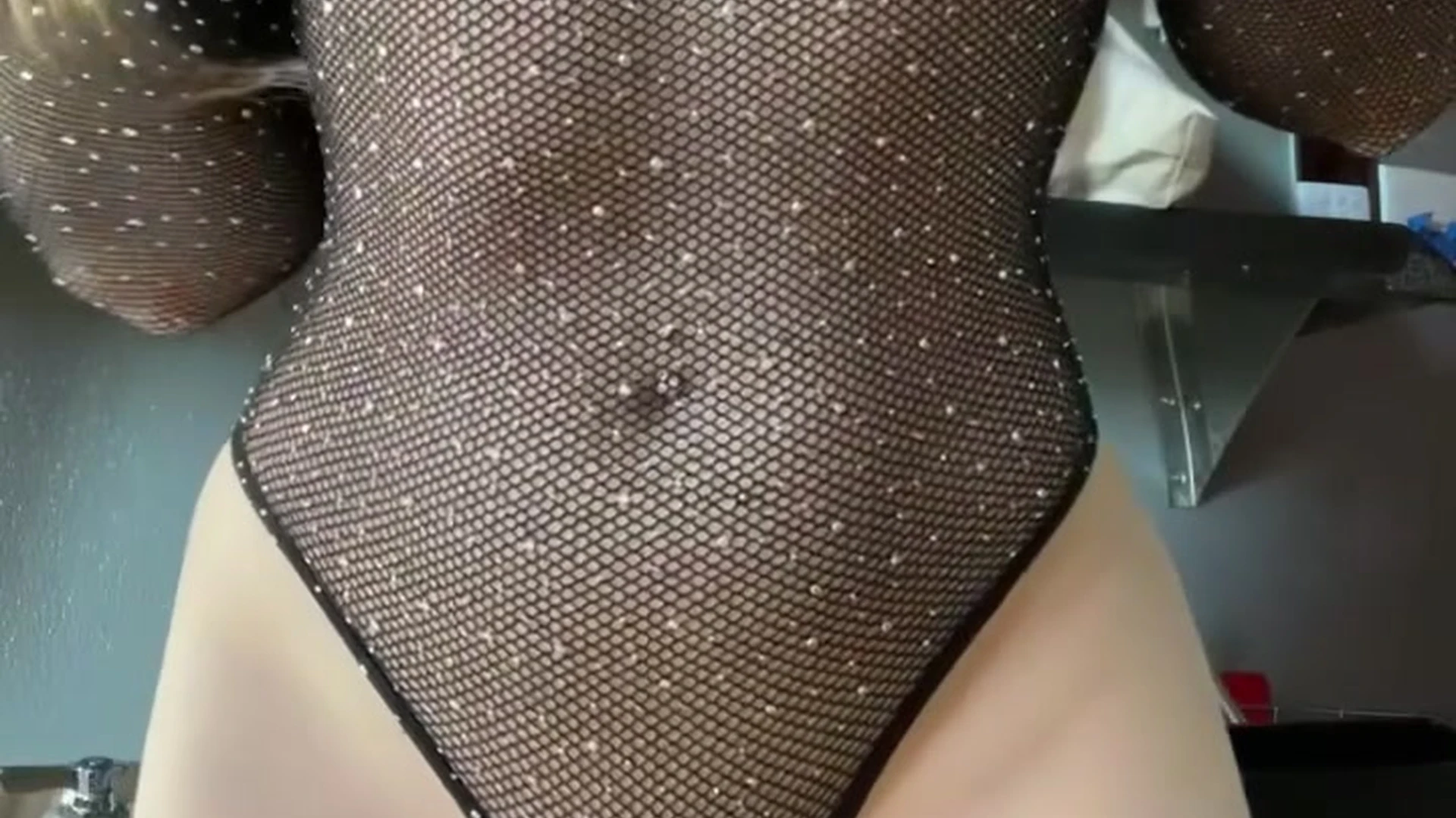 slim sexy model Danni Meow in a transparent dress playing with her tits