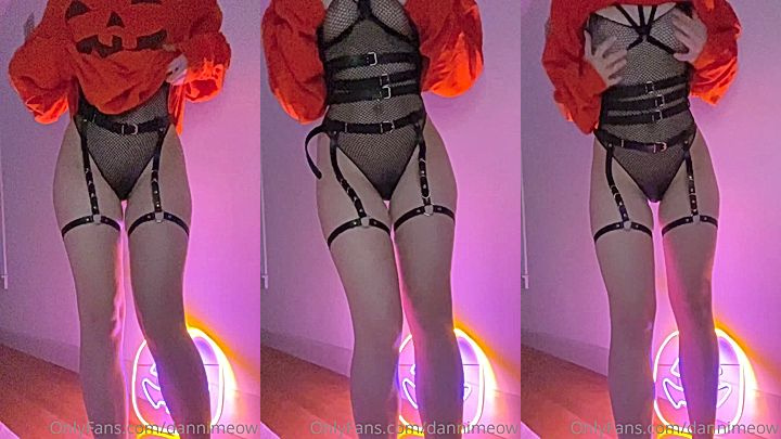 Danni Meow slowly pulling her cloth up exposing her transparent lingerie
