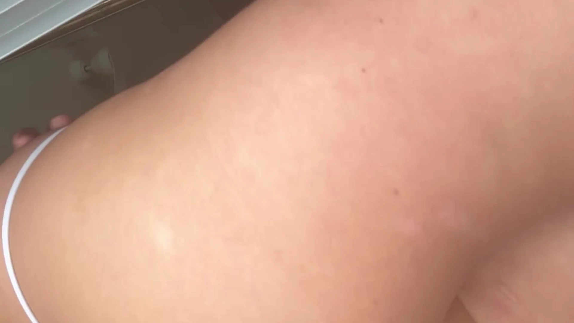 Ellaalexandraxo onlyfans taking a selfie showing off her small ass