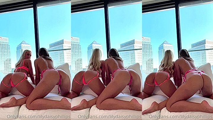 2 model in a sexy lingerie shaking their ass bouncing on the bed